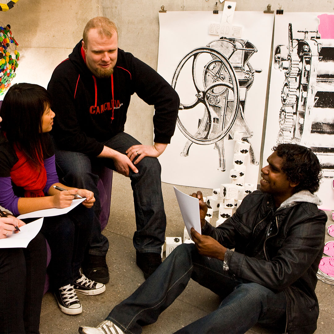 Two Arts Administration Trainees with their mentor
