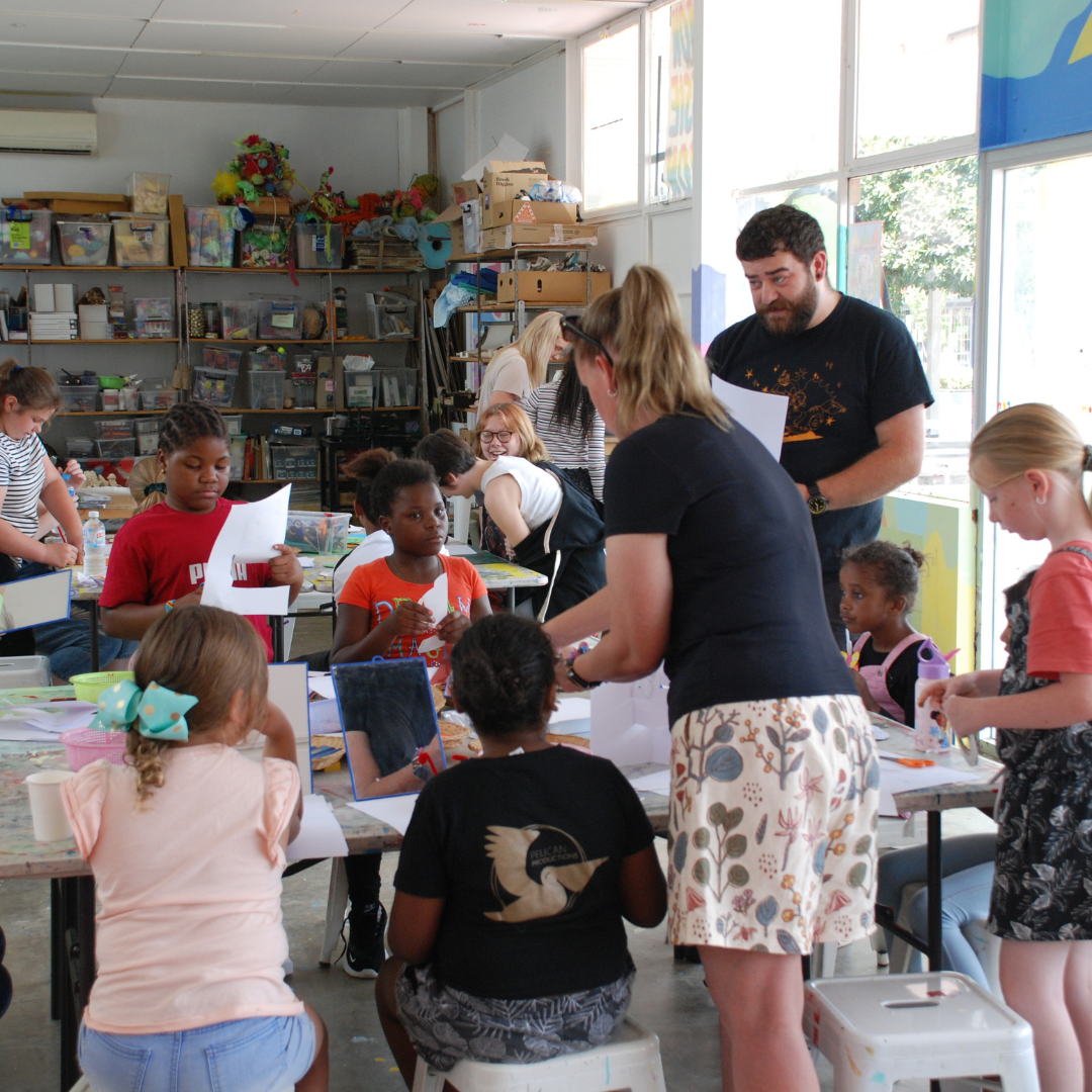 A group of teenagers in the Pom Pom studio space